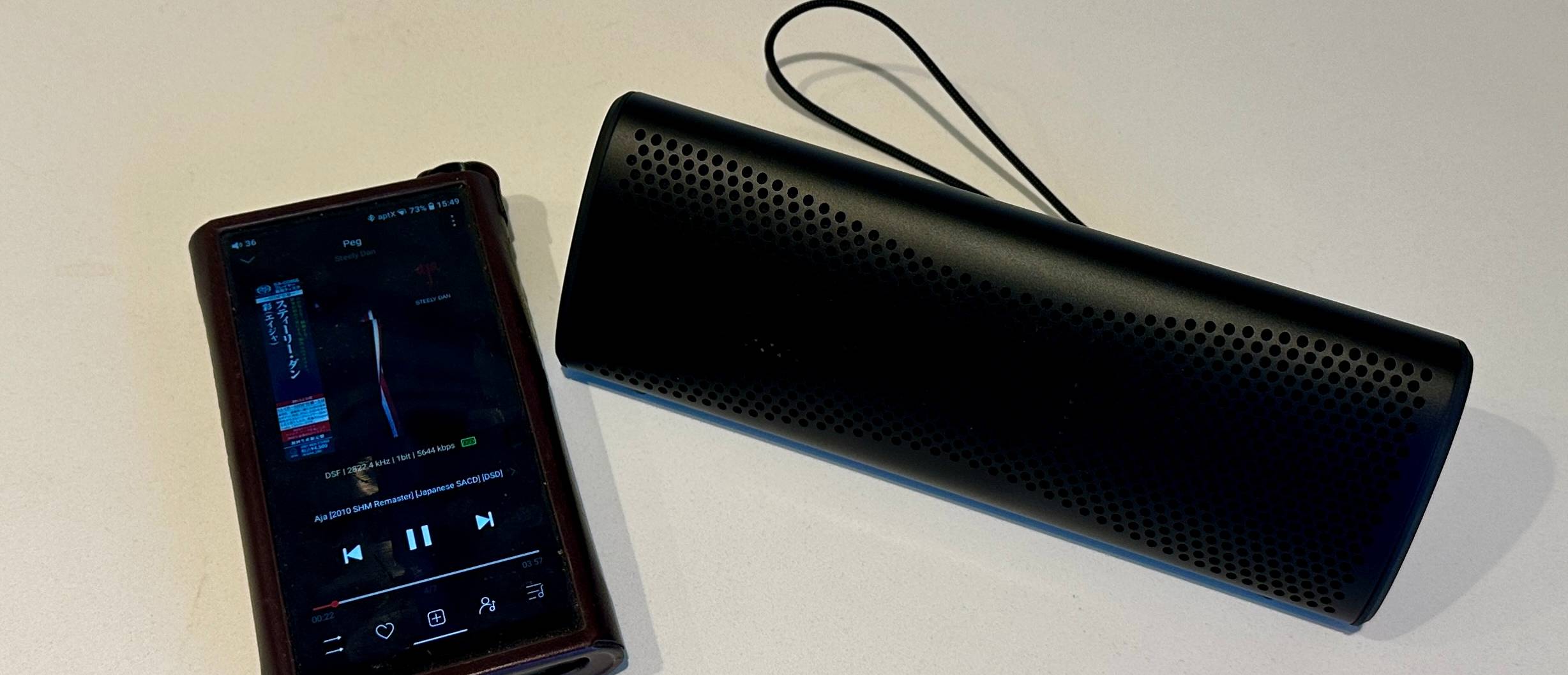 KEF Muo 2025 in black, on a white table