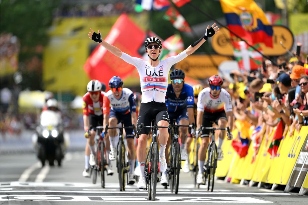 Tadej Pogacar celebrates UAE Team Emirates' successful Tour de France ...