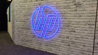 HP logo and branding pictured in blue on a wall at the HP Amplify 2025 event in Nashville, Tennessee.