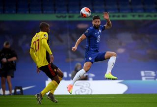 Chelsea’s Olivier Giroud (right) and Watford’s Christian Kabasele in action during the Premier League match at Stamford Bridge, London