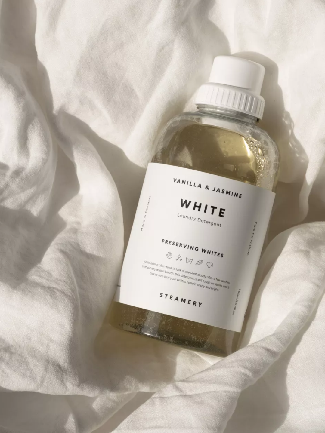 A bottle of liquid detergent with vanilla and jasmine scent from Steamery