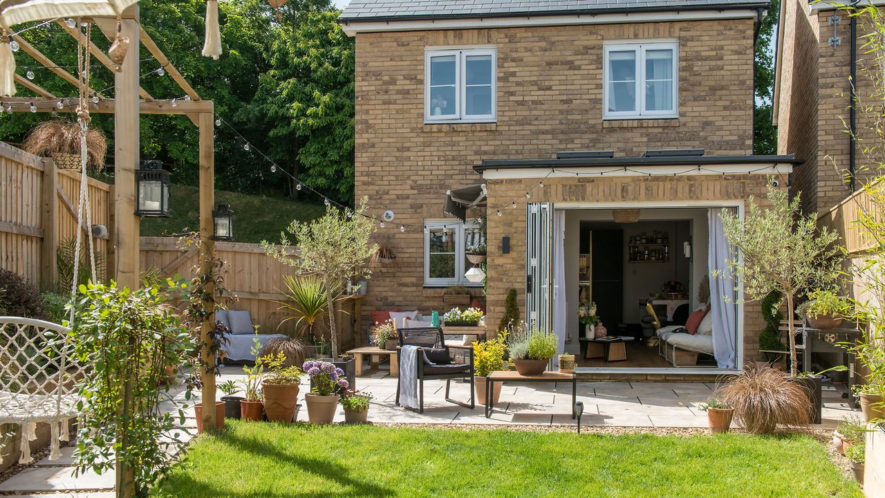 Patio area with outside seating and lawned area