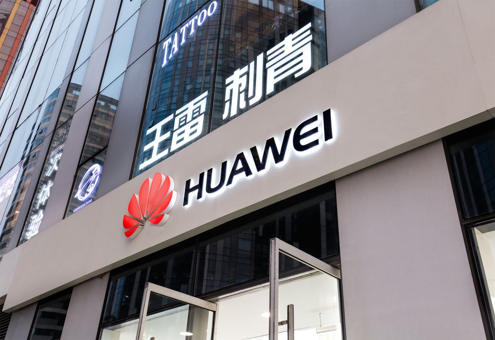 Huawei logo displayed on a shopfront