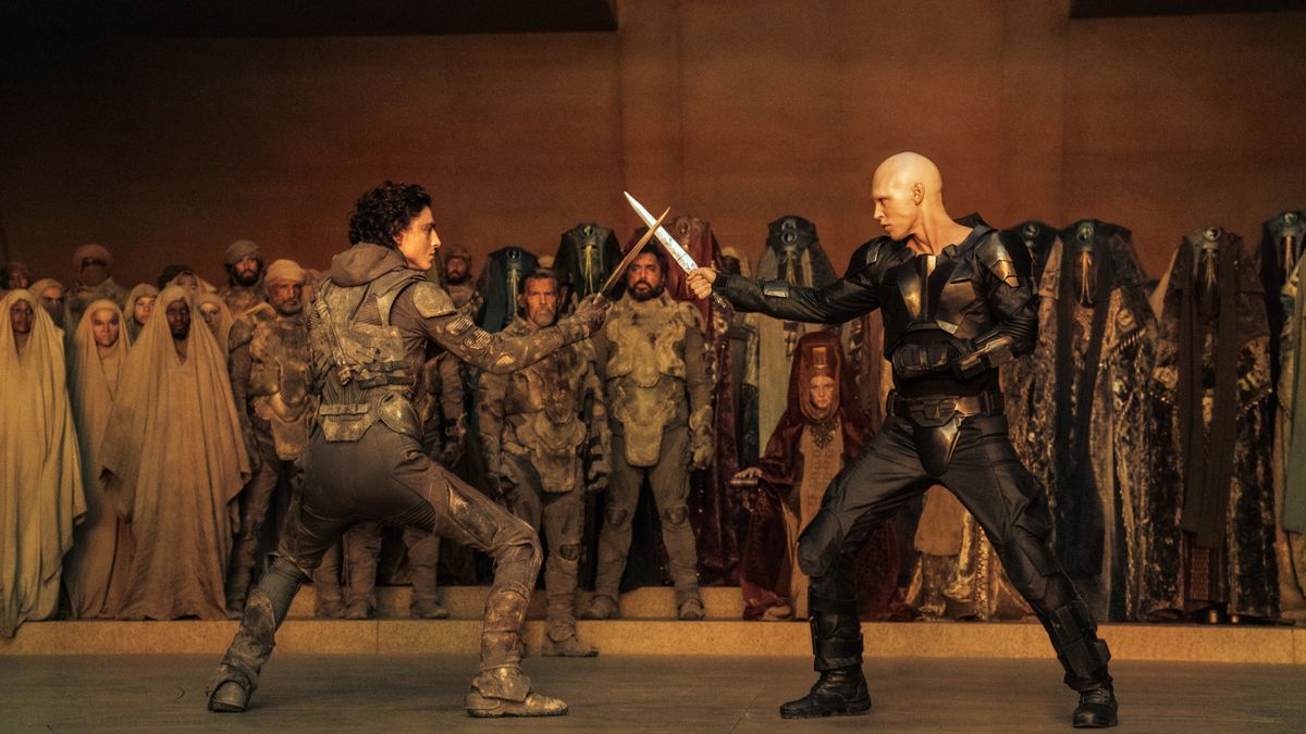 Paul (Timothée Chalamet) and Feyd-Rautha (Austin Butler) cross swords in Dune: Part Two