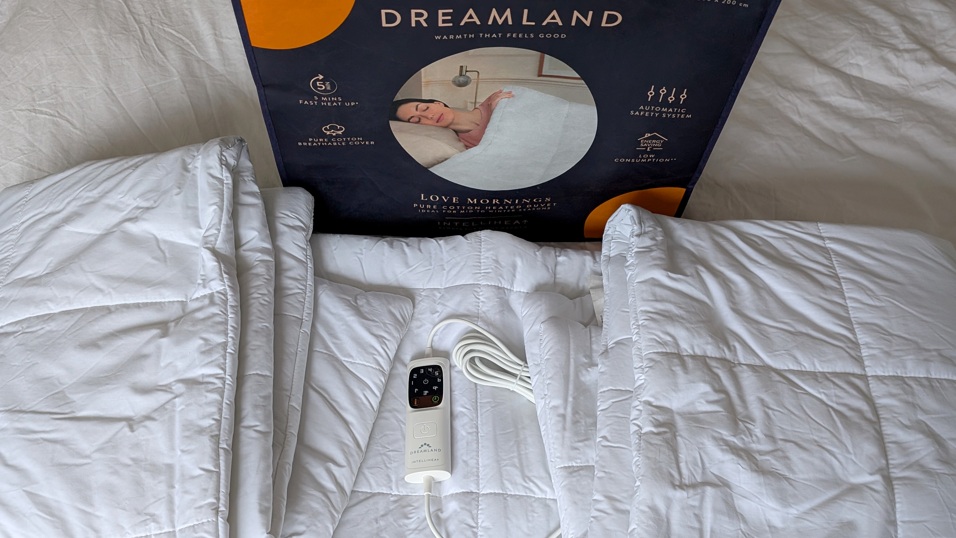 Dreamland Love Mornings Pure Cotton Heated Duvet being tested on a bed