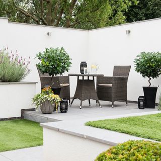white marble flooring garden with out door dining set