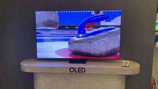 Samsung S95D QD-OLED on a marble stand