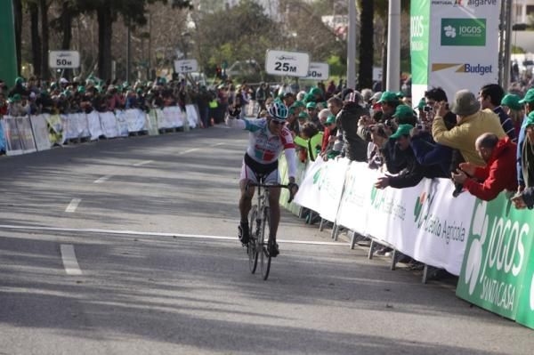 Philippe Gilbert solos to victory in the first stage.