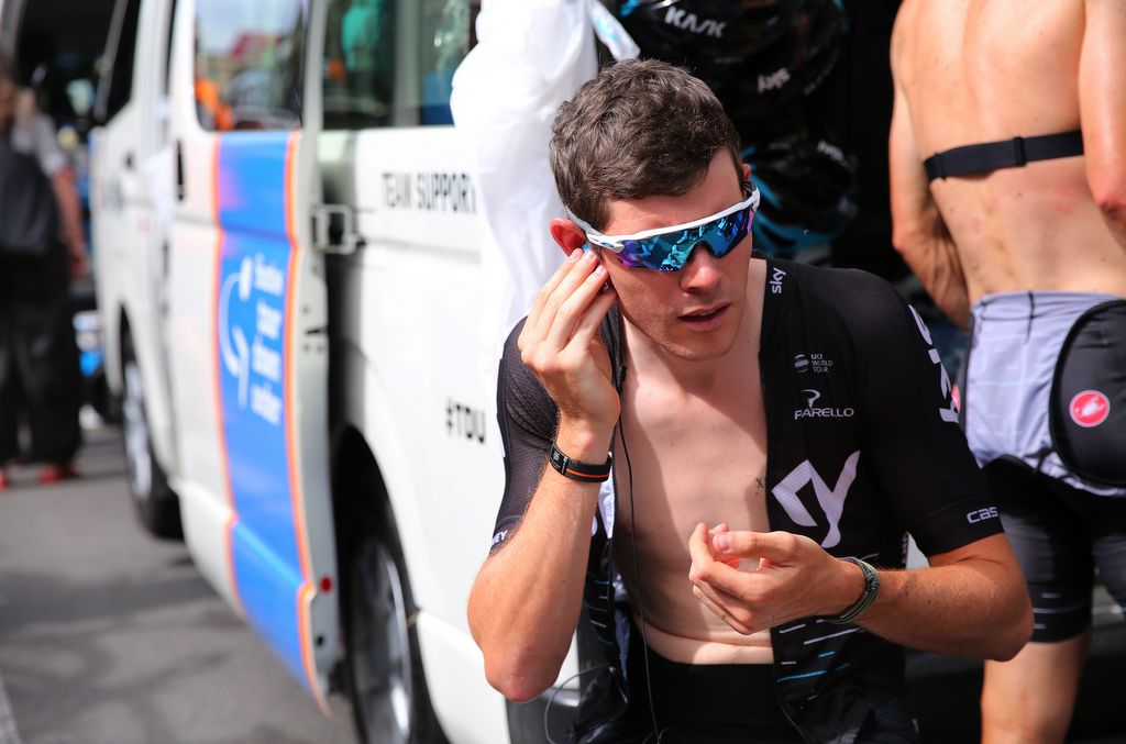 Luke Rowe (Team Sky) checks the radio