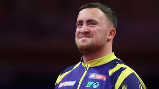Luke Littler of England smiles during the Final match between James Wade of England and Luke Littler of England on day nine of the 2025 Betfred World Matchplay at Winter Gardens on July 27, 2025 in Blackpool, England.