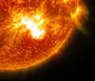 A massive X3.1 solar flare erupts from the giant sunspot AR 12192 on Oct. 24, 2014 in this close-up view from NASA's Solar Dynamics Observatory, a spacecraft that constantly watches Earth's nearest star.