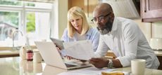 Couple looking over account statement