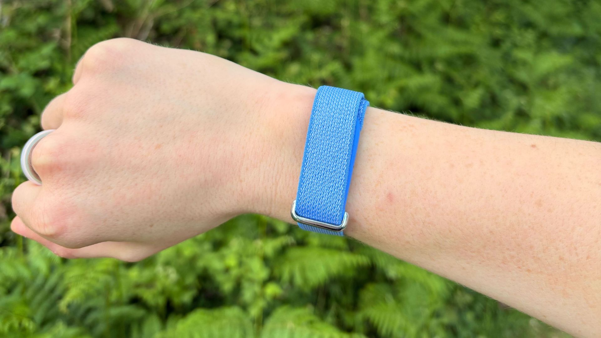 Grace Walsh wearing Fitbit Air in park