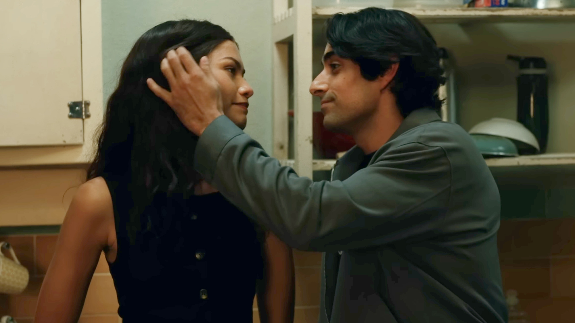 Zendaya, in a black top, and Eman Esfandi in a grey long sleeve, look at eachother longingly in Spider-Man: Brand New Day (2026).