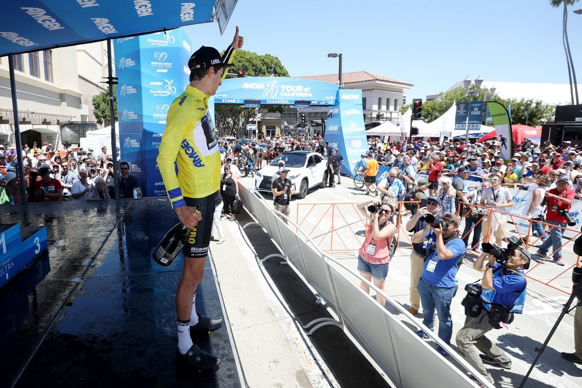 2017 Tour of California winner George Bennett waves from the podium