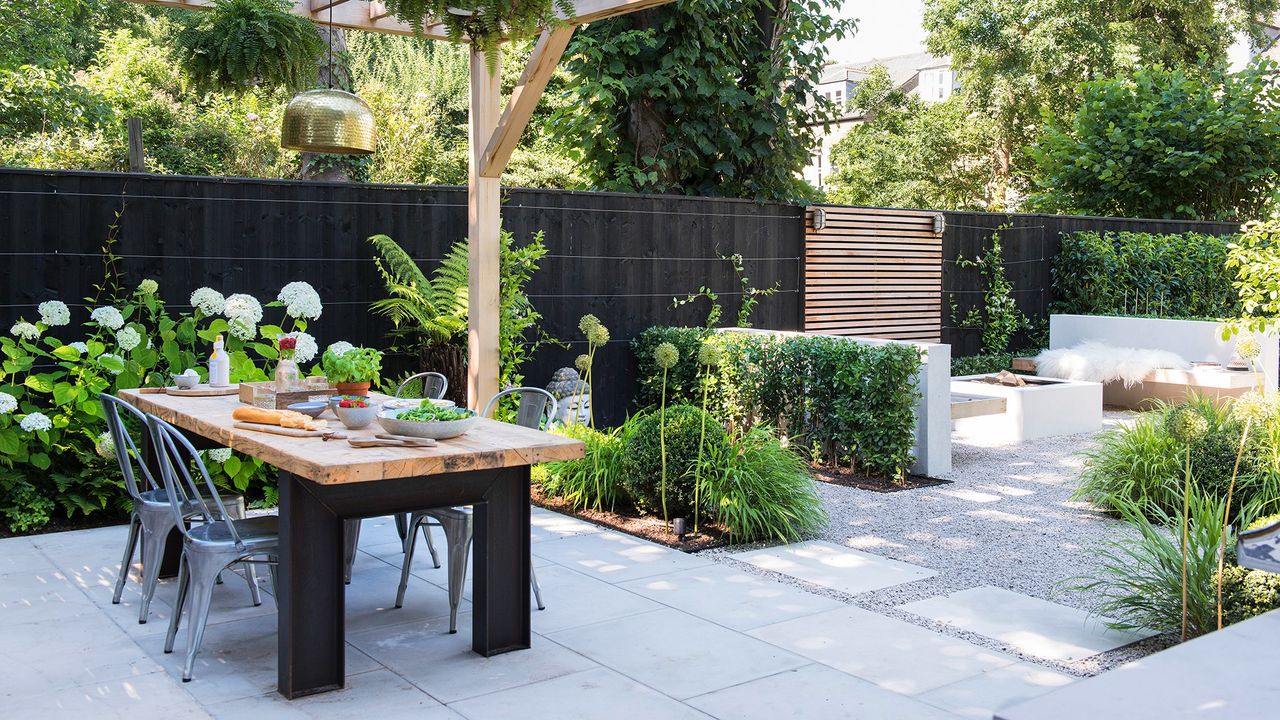 Wooden pergola covering an outdoor seating area