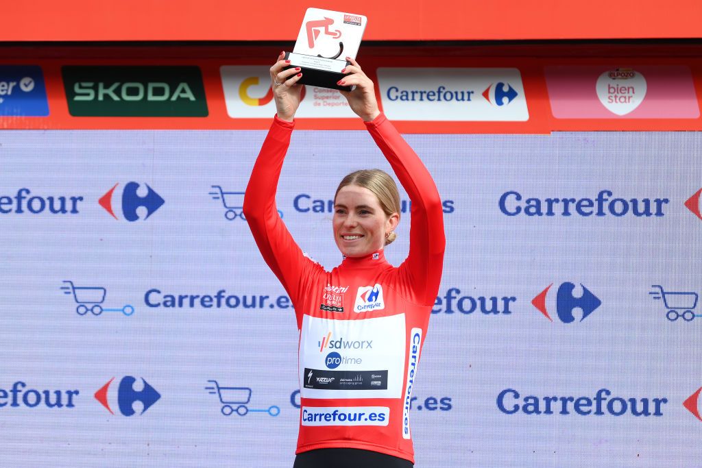 VINUESA SPAIN MAY 03 Demi Vollering of The Netherlands and Team SD Worx Protime celebrates at podium as Red Leader Jersey winner during the 10th La Vuelta Femenina 2024 Stage 6 a 1321km stage from Tarazona to La Laguna Negra Vineuesa 1722m UCIWT on May 03 2024 in Vineuesa Spain Photo by Alex BroadwayGetty Images