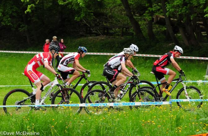 107 Junior Men riding through the flowers