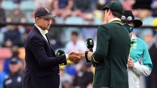 Captains Joe Root of England and Pat Cummins of Australia shaking hands ahead of an Ashes cricket Test
