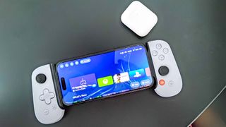 The Backbone One controller using an iPhone and AirPods