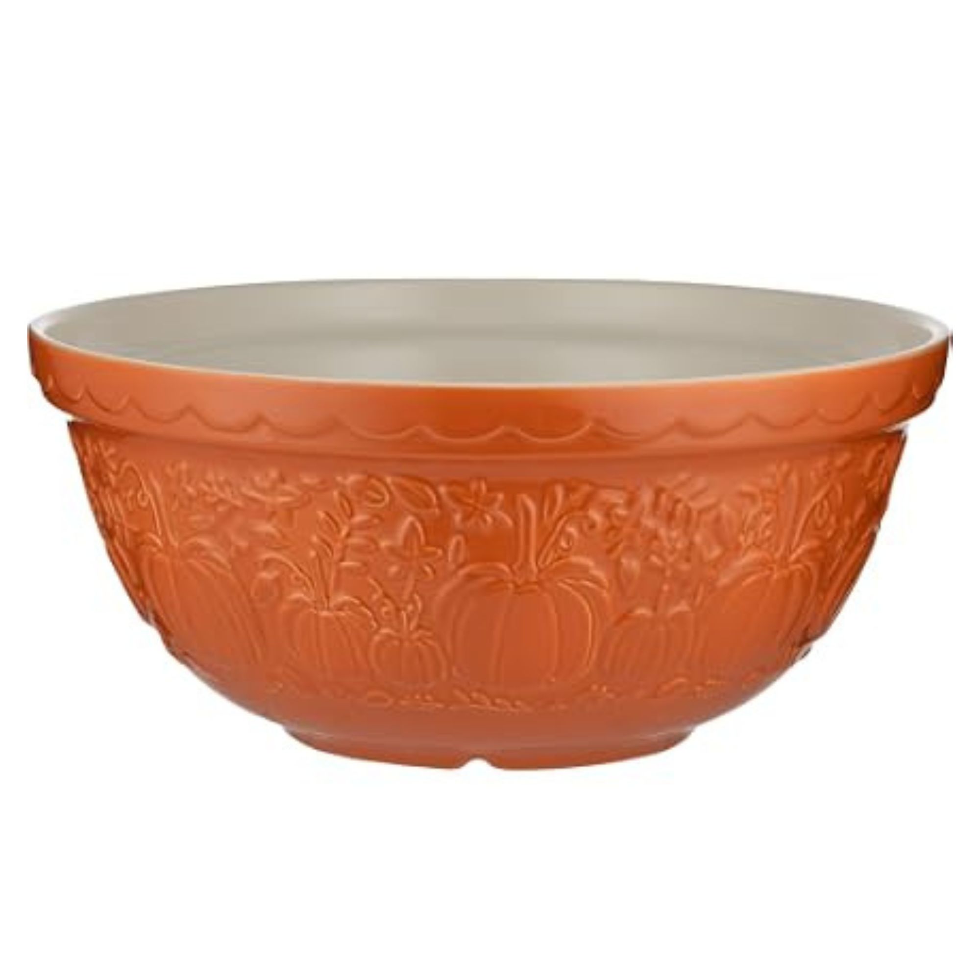 An orange mixing bowl with a pumpkin motive on the side.