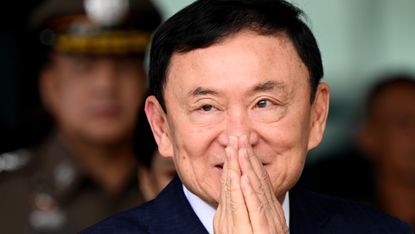 Thaksin Shinawatra greets supporters at Don Mueang International Airport, 22 August 2023