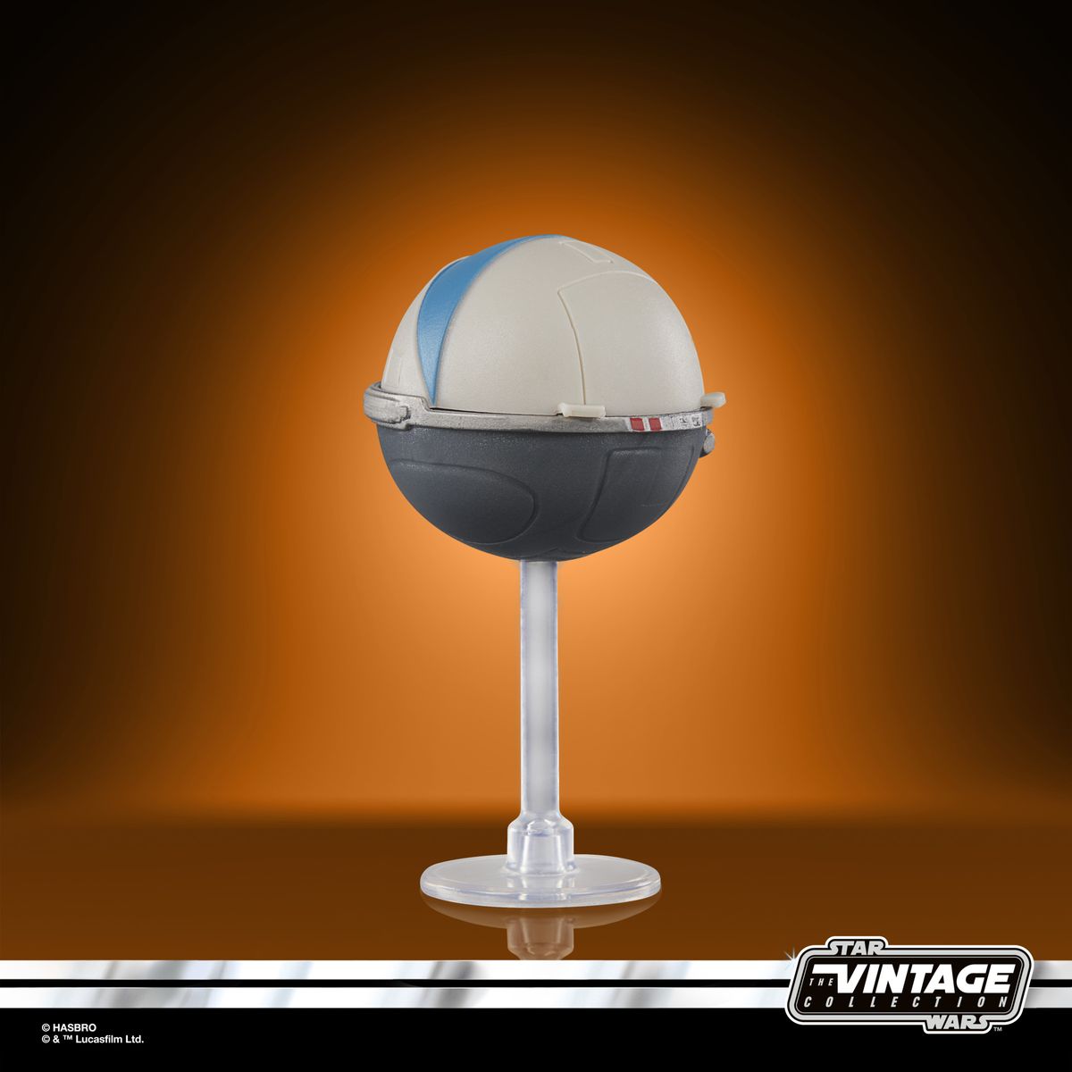 The Vintage Collection Grogu figure on an orange and black background