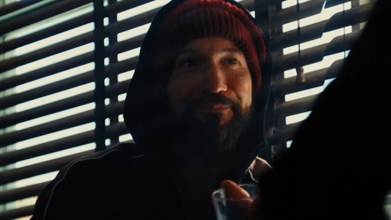 Mikey smiling at a bar in Gary.
