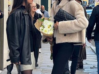 French women wearing trendy coats.