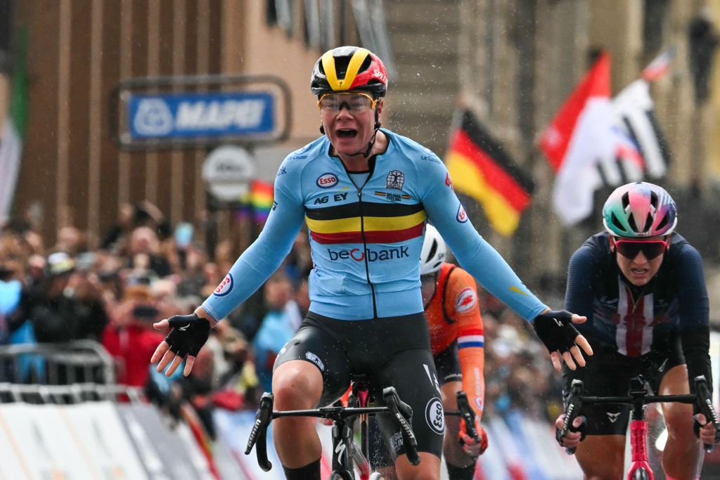 Belgium's Lotte Kopecky crosses the finish line and wins the women's Elite Road Race cycling event during the UCI 2024 Road World Championships, in Zurich, on September 28, 2024. (Photo by Fabrice COFFRINI / AFP)