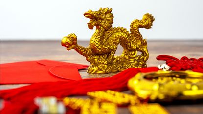 A gold dragon represents the Year of the Dragon.