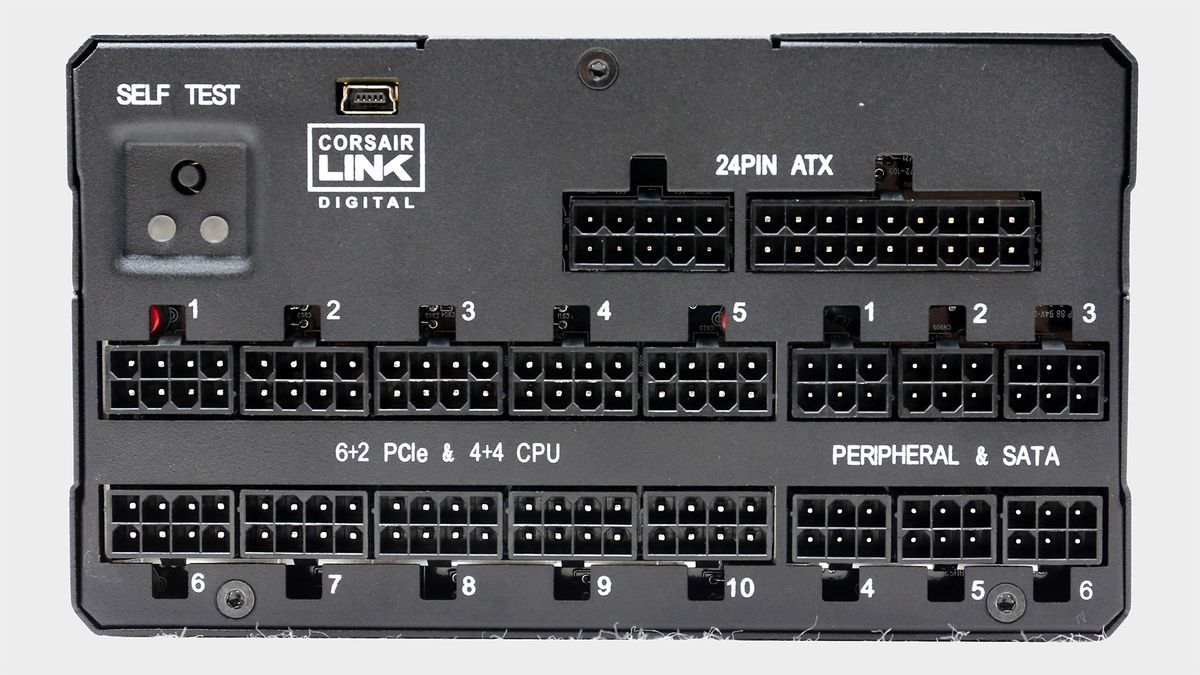 Corsair AX1600i power supply with cables.