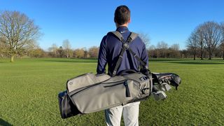 Vessel Player V Stand Bag on shoulders