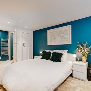 bedroom with teal colour wall