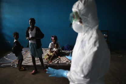 A health worker in an ebola isolation ward in Liberia