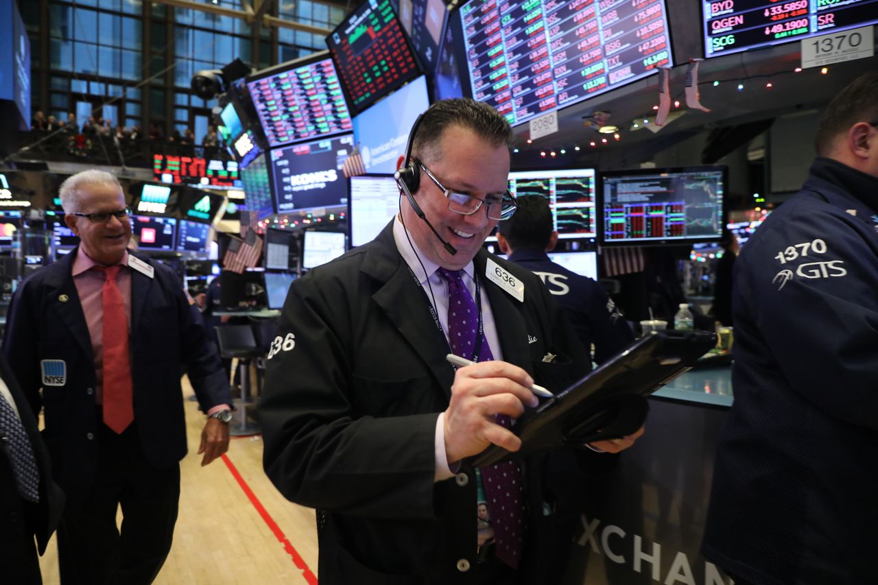 Traders on the floor of the NYSE