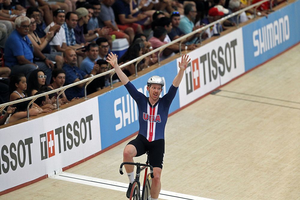 US cyclist Daniel Holloway celebrates the first place in the men's Omnium Points Race 4\4, during the Tissot UCI Track Cycling World Cup
