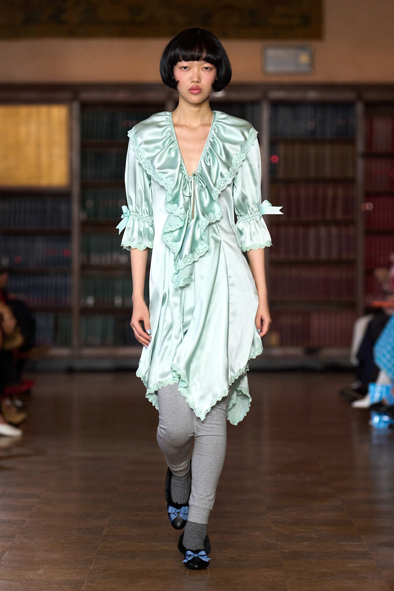 models walk the Sandy Liang Fall 2026 fashion show runway wearing slipper shoes 