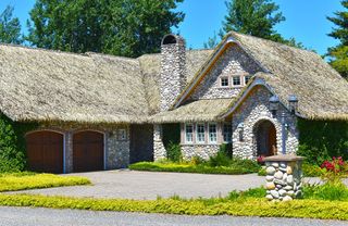 Storybook thatched roof home in the pacific northwest city of Ferndale, Washington, USA