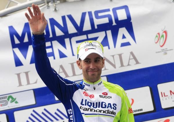 Vincenzo Nibali (Liquigas-Cannondale) salutes from the podium.
