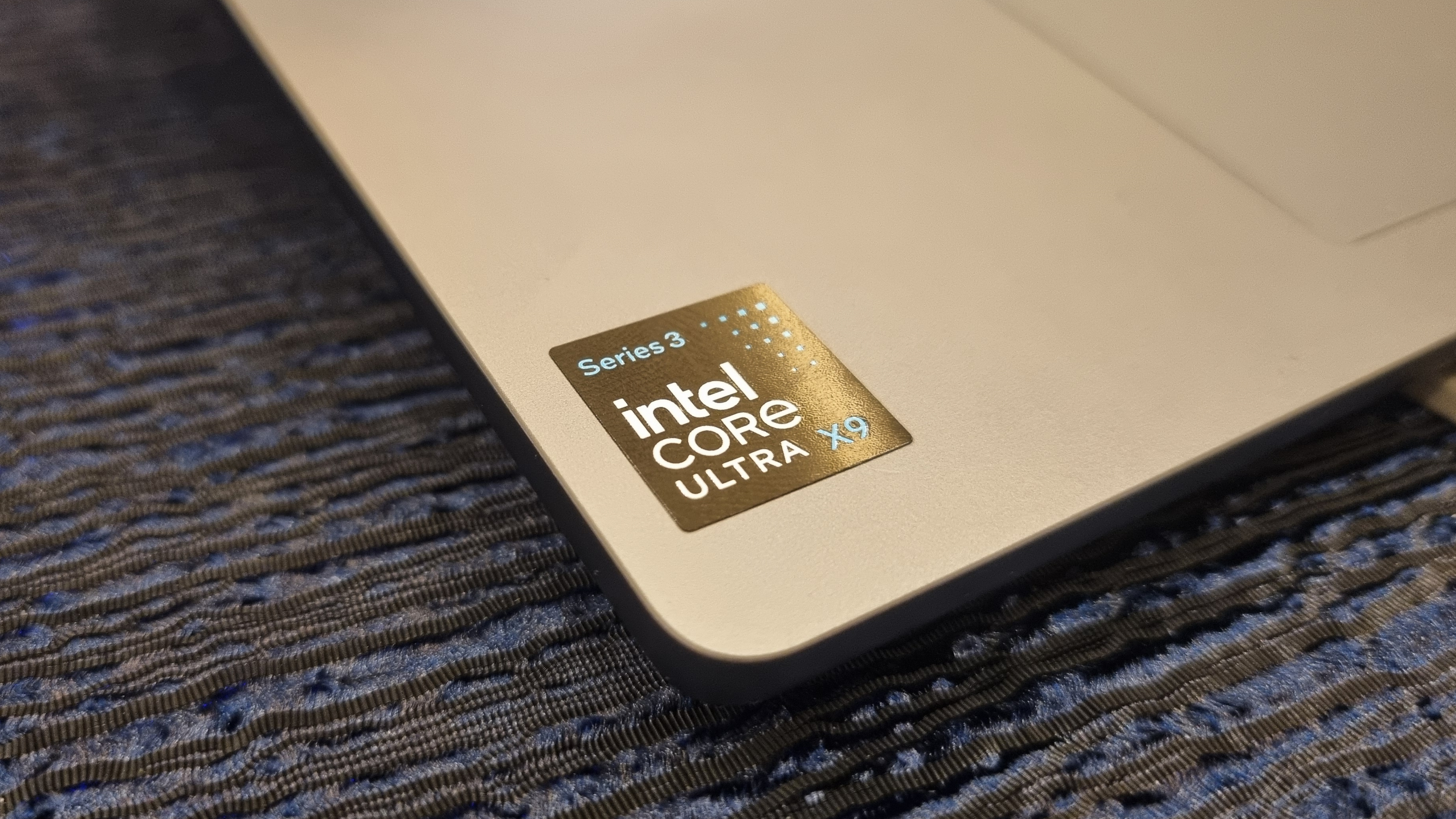An Intel Core Ultra badge on an AI PC