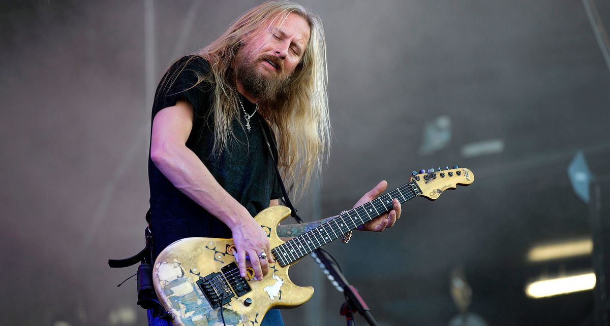 Jerry Cantrell of Alice In Chains plays his iconic &quot;Blue Dress&quot; G&amp;L Rampage onstage in Australia in 2009. Bought in 1985, its eponymous graphic has been worn away after decades of use.