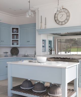 Powder blue kitchen cabinets designed by Tom Howley
