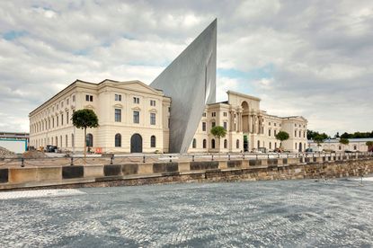 The centrepiece of Libeskind's redesign of the Military History Museum is a hulking five-storey, 200 tonne wedge of glass, concrete and steel that thrusts up through the middle of the original building built in 1897