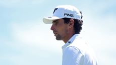 Joaquin Niemann wearing a white Ping cap and white polo shirt during the US Open