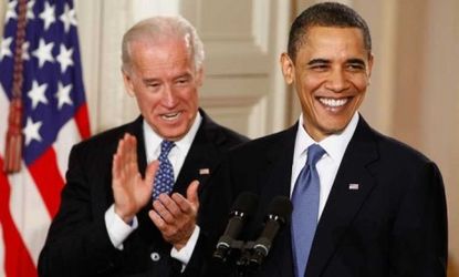 Vice President Joe Biden applauds President Obama during the signing of the Affordable Care Act, which he declared a "big f--king deal" in a hot-mic comment widely derided as a gaffe.