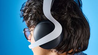 A black and white Sony PlayStation Pulse Elite wireless gaming headset for PS5 and PS Portal