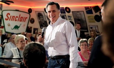 Mitt Romney speaks to supporters at Charlie Parker&amp;#039;s Diner in Springfield, Ill., ahead of the state&amp;#039;s Tuesday primary, which the frontrunner is expected to dominate.