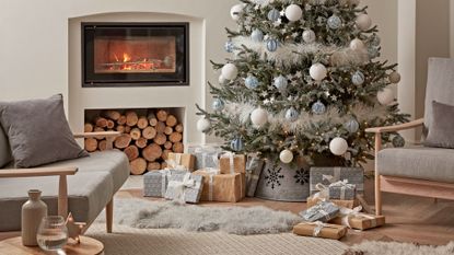 christmas tree with fireplace and armchair