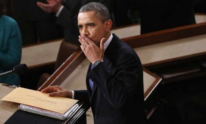 During his State of the Union address, President Obama blows a kiss to his wife... and maybe to America, too.